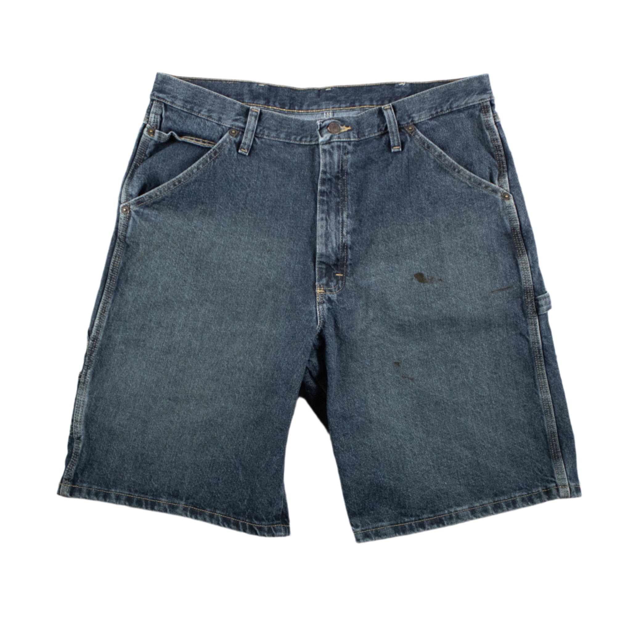 Blue denim shorts on a textured gray background