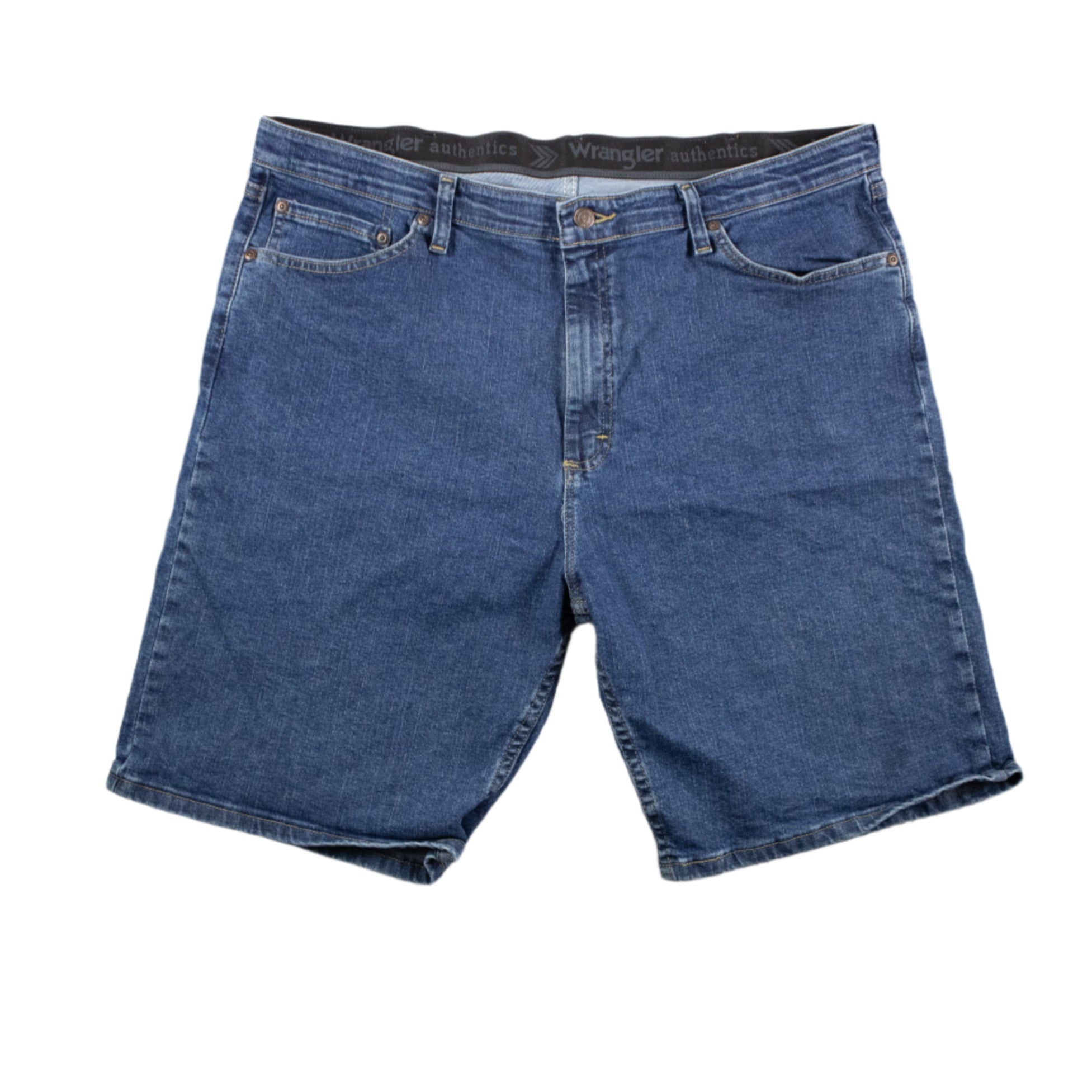 Blue denim shorts on a textured gray background