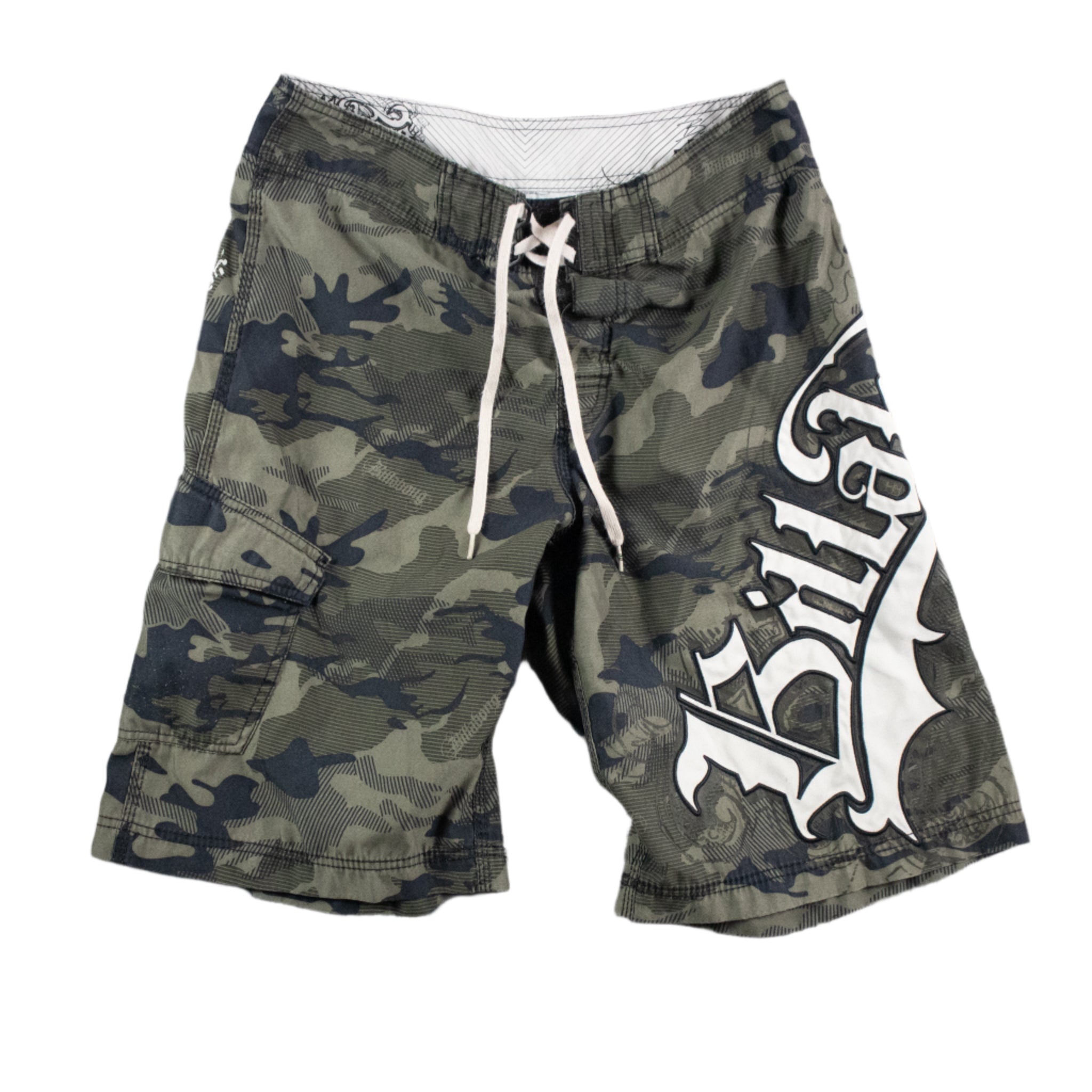 Camouflage shorts with a visible brand logo on a textured gray background