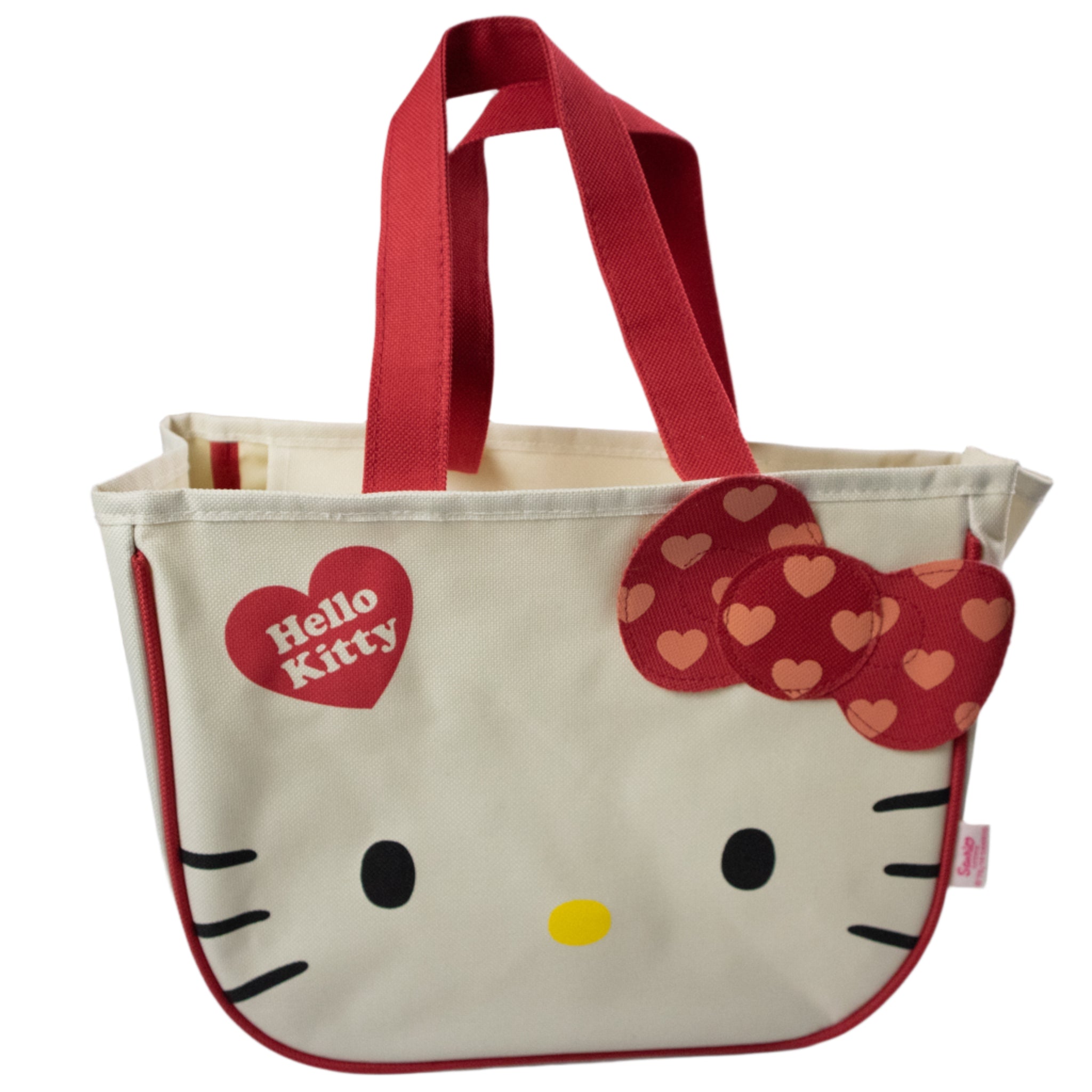 Hello Kitty bag with red handles and heart design on a gray background
