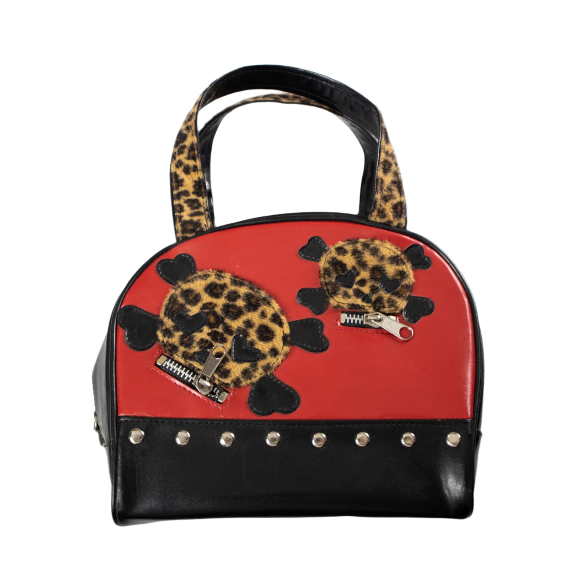 Handbag with leopard print skull designs on a red and black background