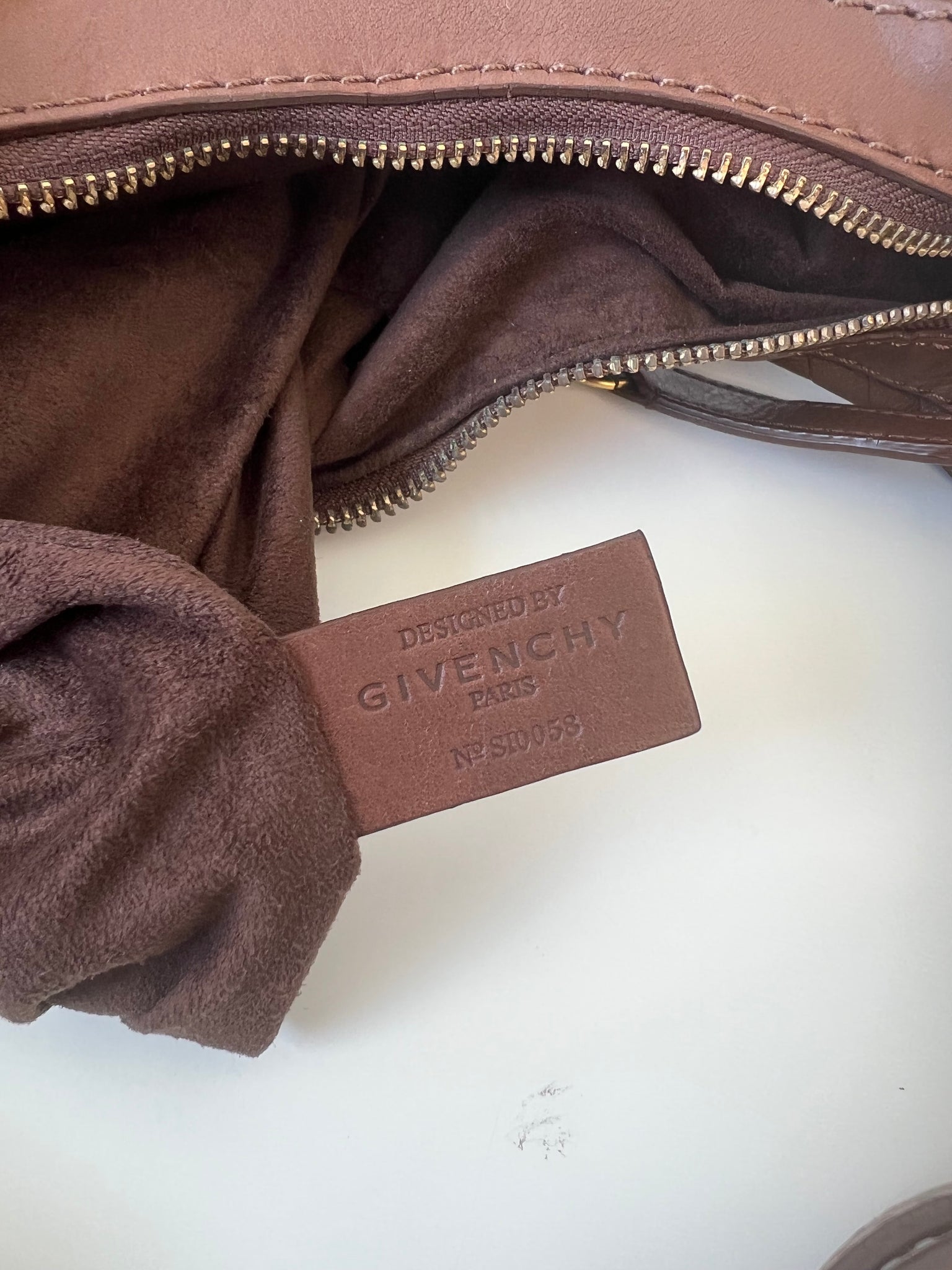 GIVENCHY SIGNATURE EMBOSSED LEATHER HOBO BAG / BROWN