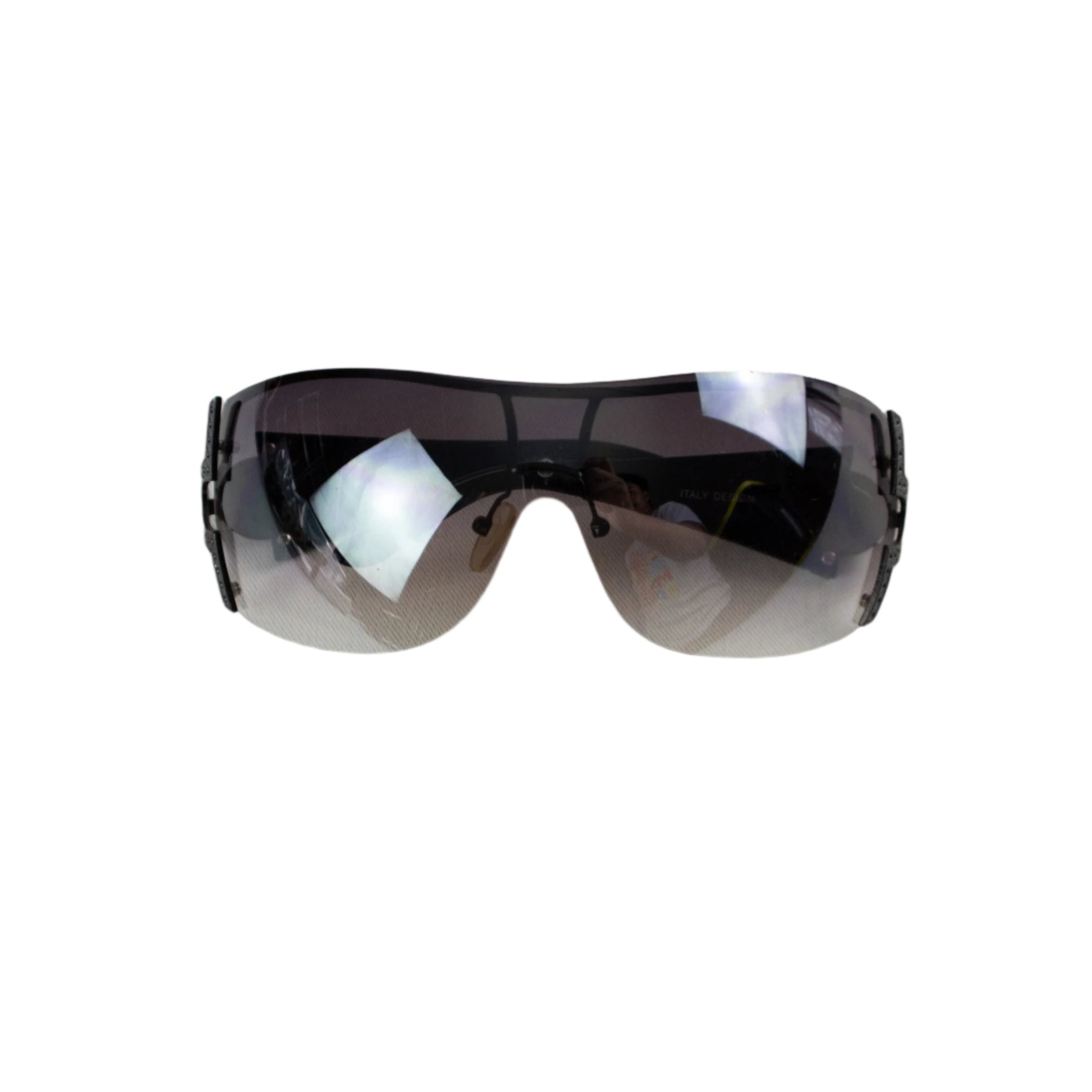 Black sunglasses with reflective lenses on a light gray background