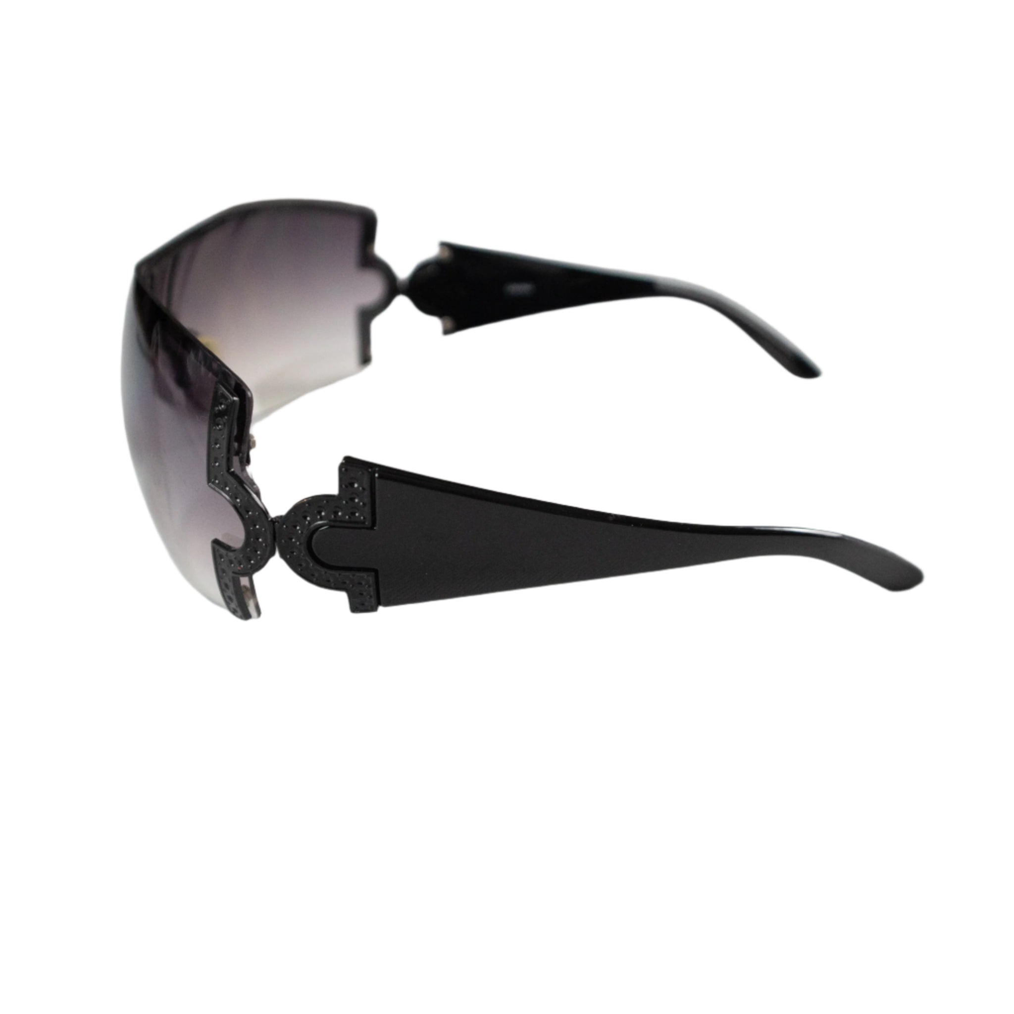 Black sunglasses with gradient lenses on a white surface