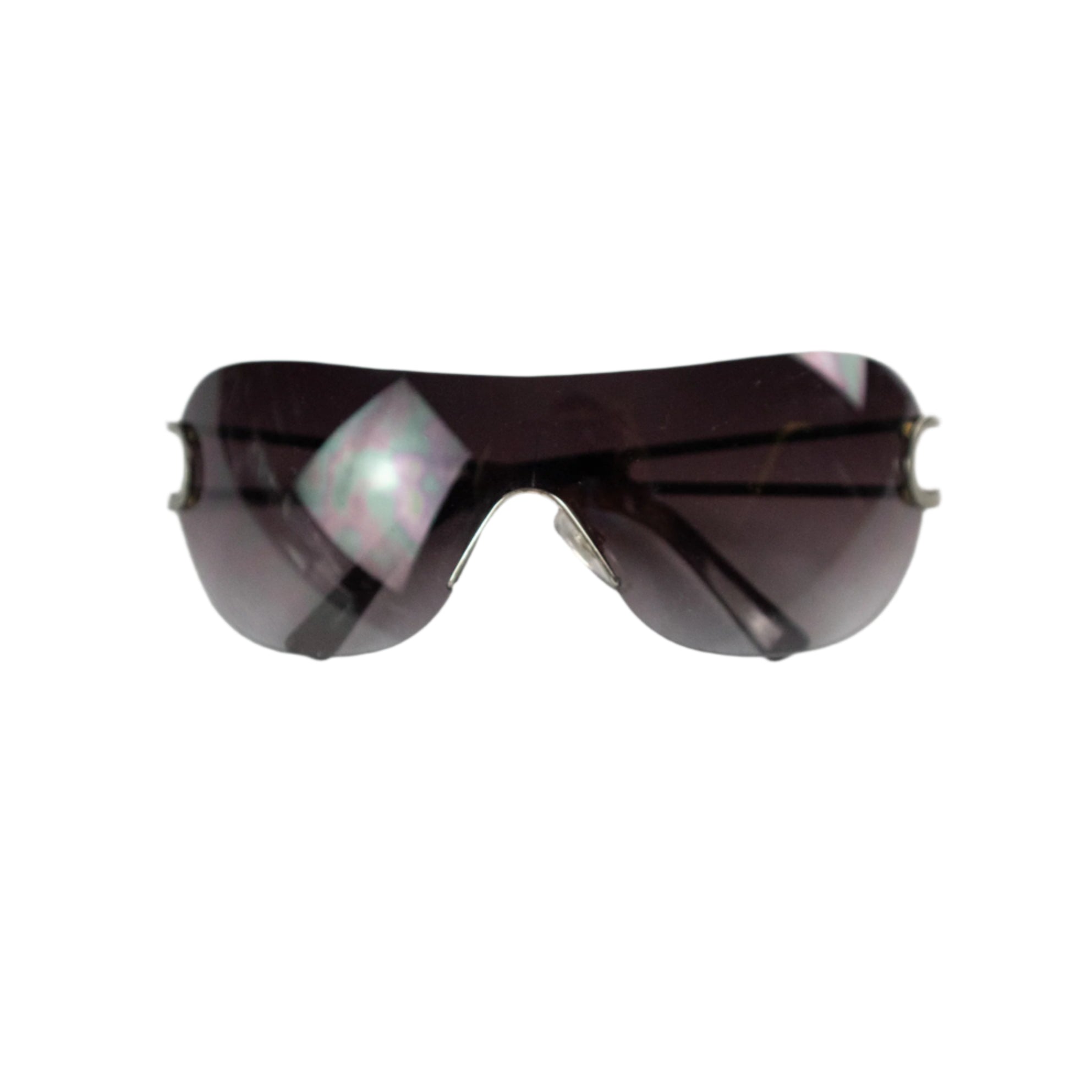 Sunglasses with a reflective surface on a light gray background