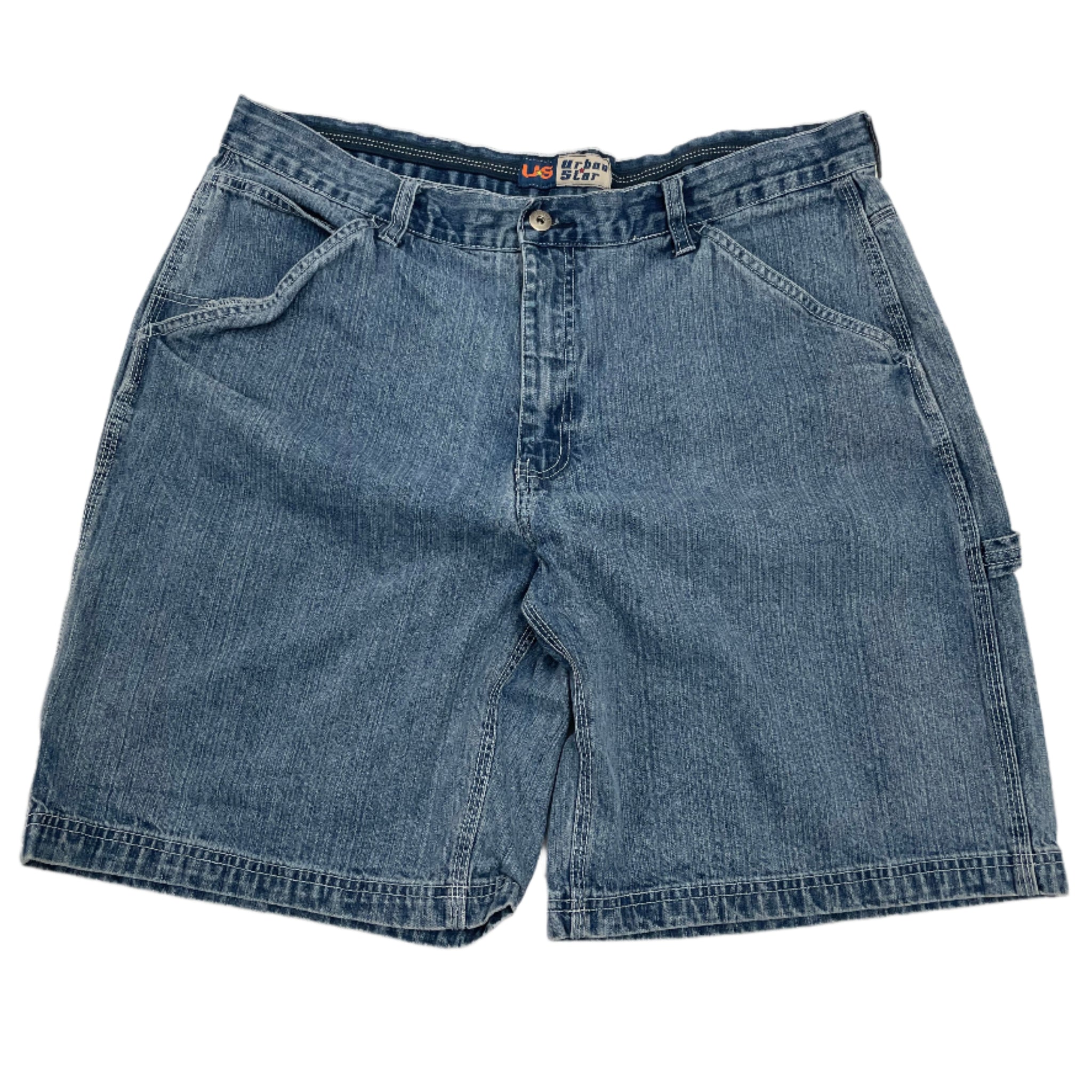 Pair of blue denim shorts on a light gray background