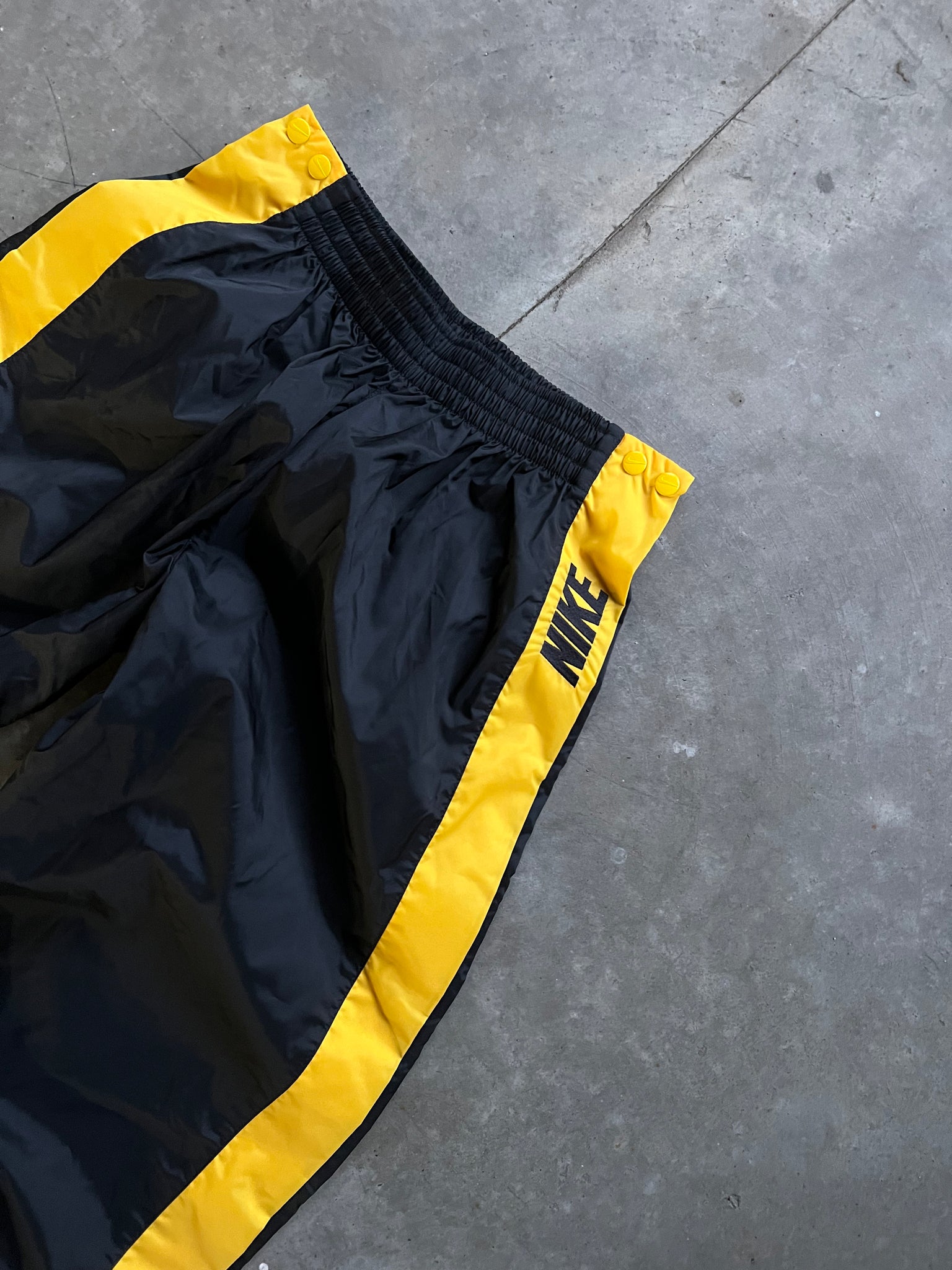 NIKE YELLOW TEARAWAY PANTS / 27X31.5