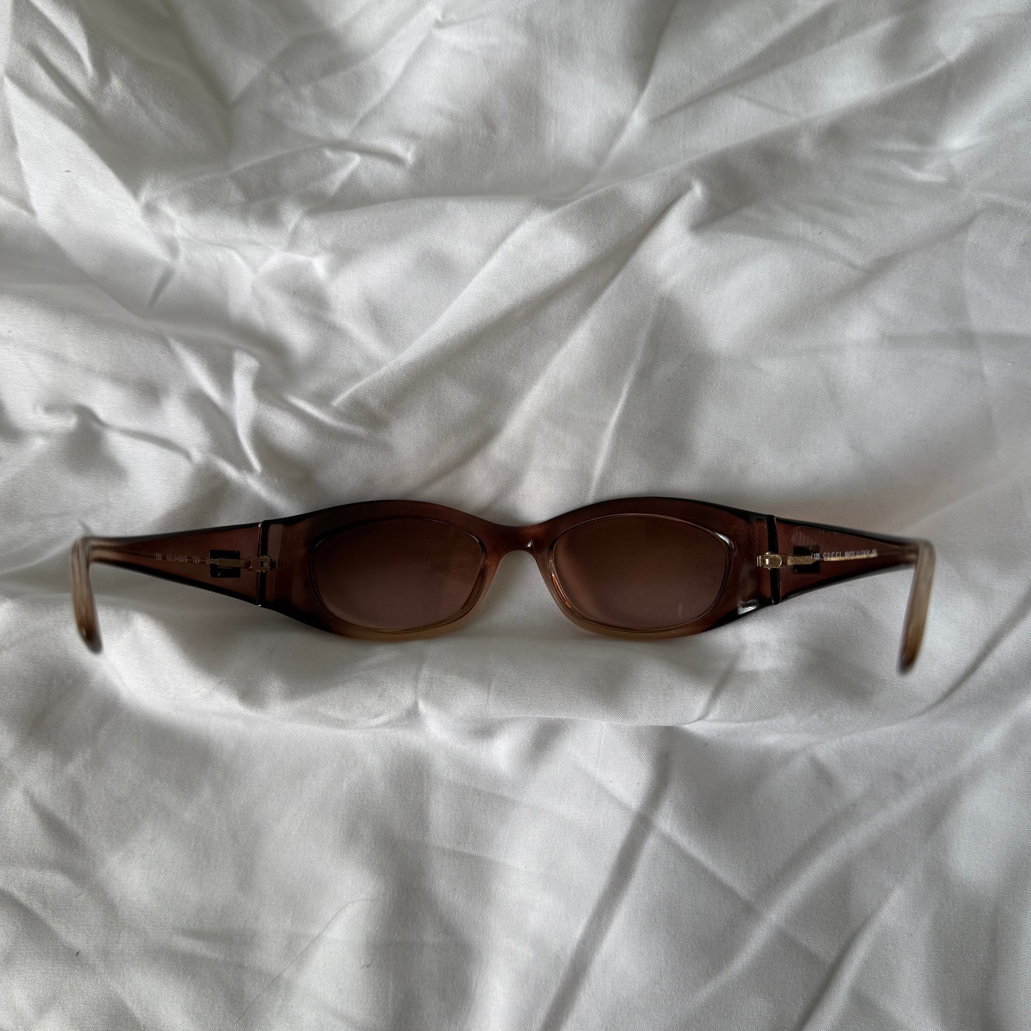 Gucci G sunglasses in brown / OS