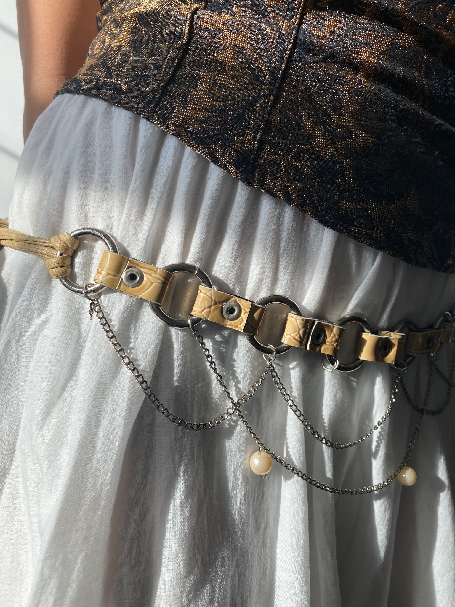 Beige leather and chain cowgirl belt