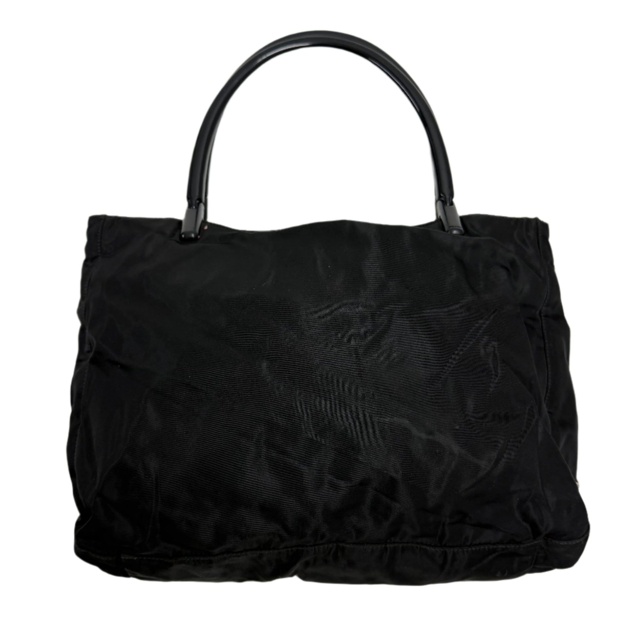 Black handbag on a light gray background Prada highend designer nylon luxury Front detail shot