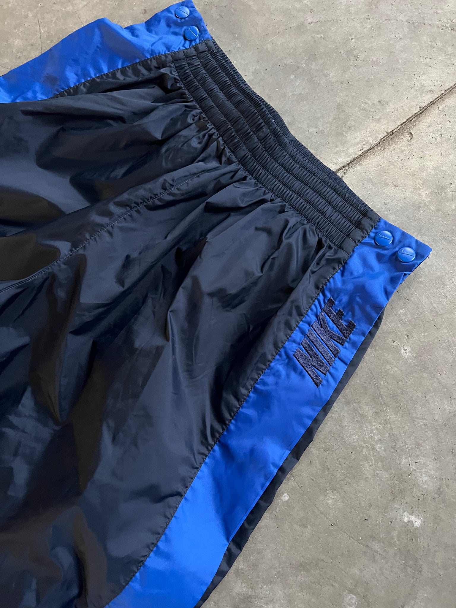 NIKE BLUE TEARAWAY PANTS / 27X32