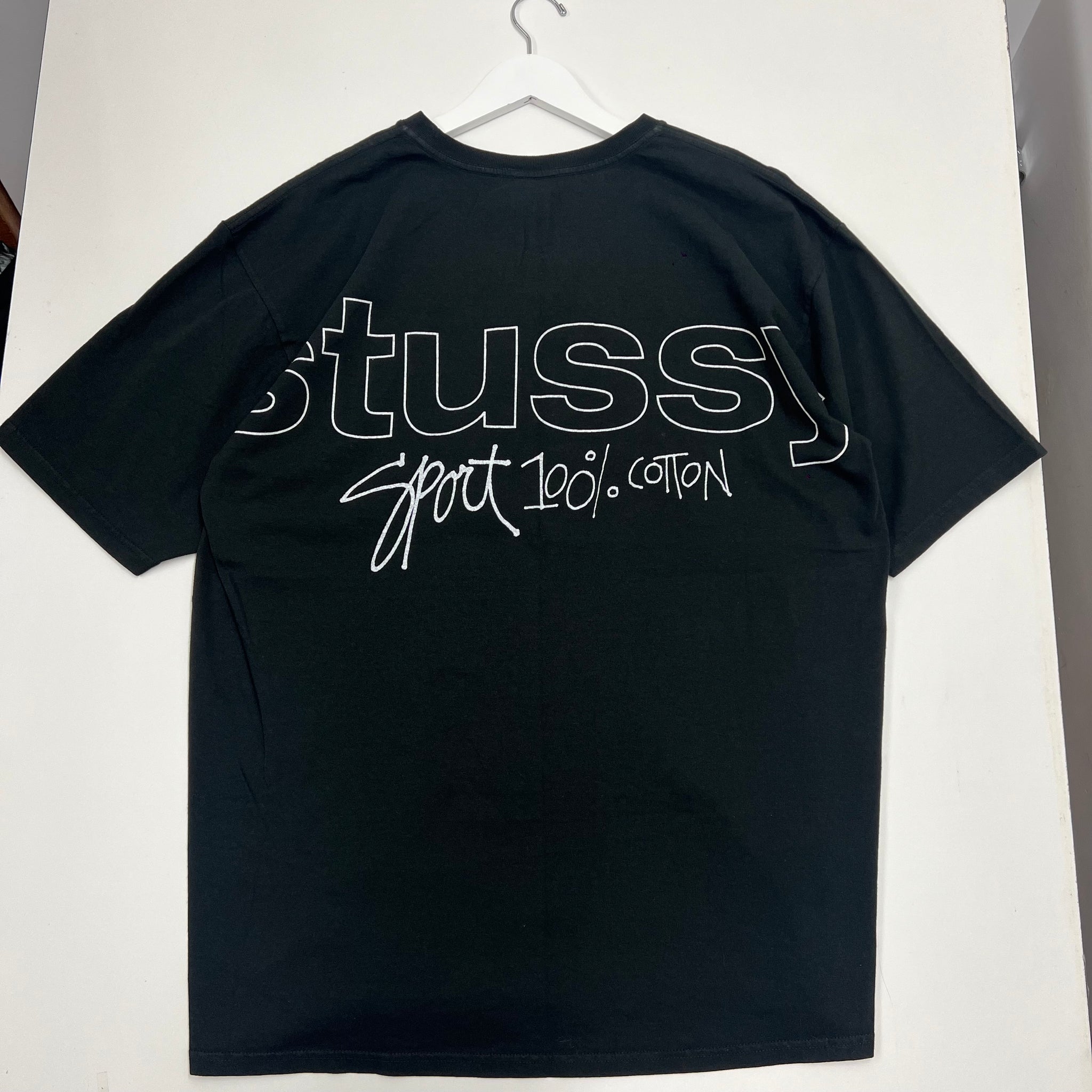 black stussy all over print graphic tee shirt