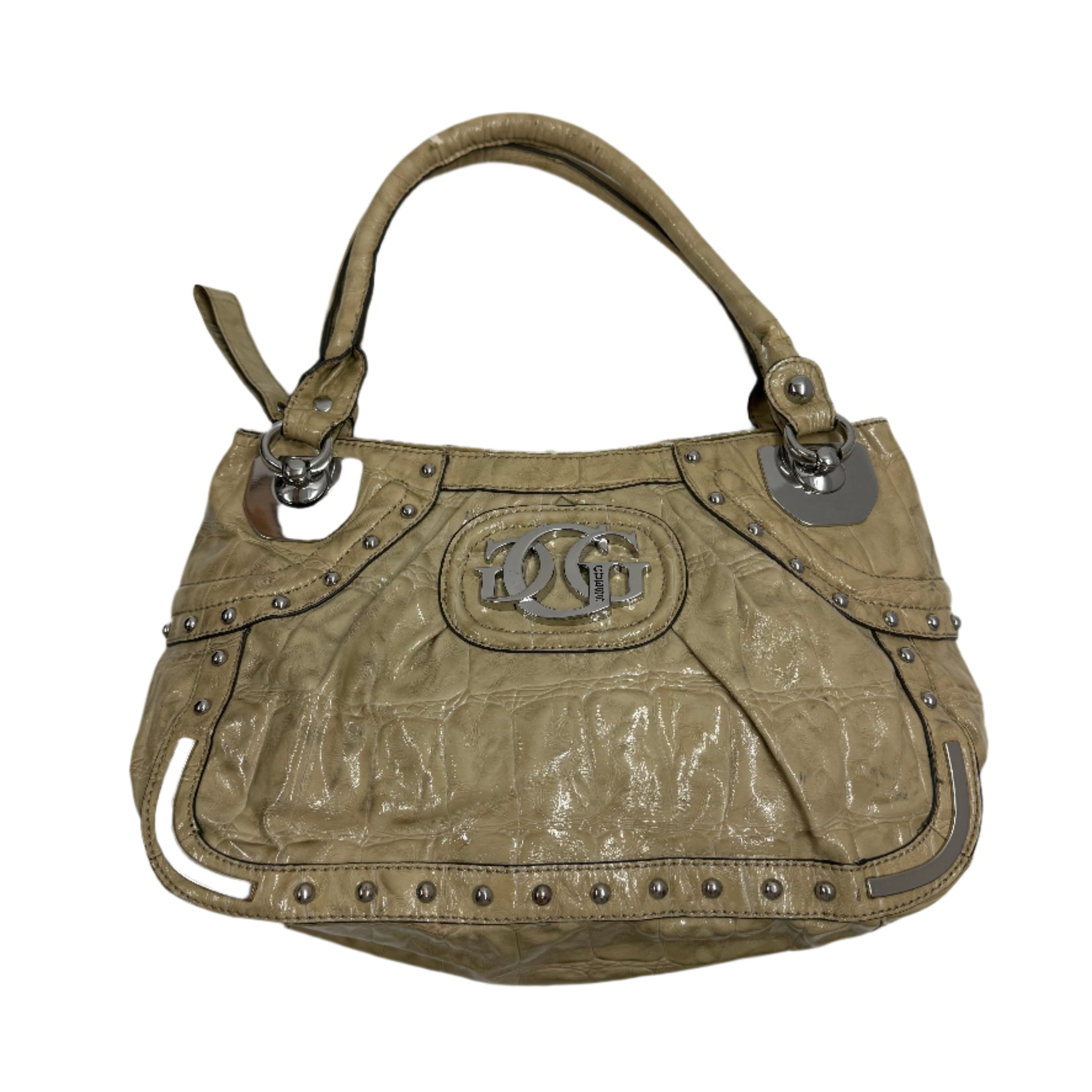 Vintage-style handbag with studded details on a white background Guess patten leather with silver hardware design Y2K grunge style