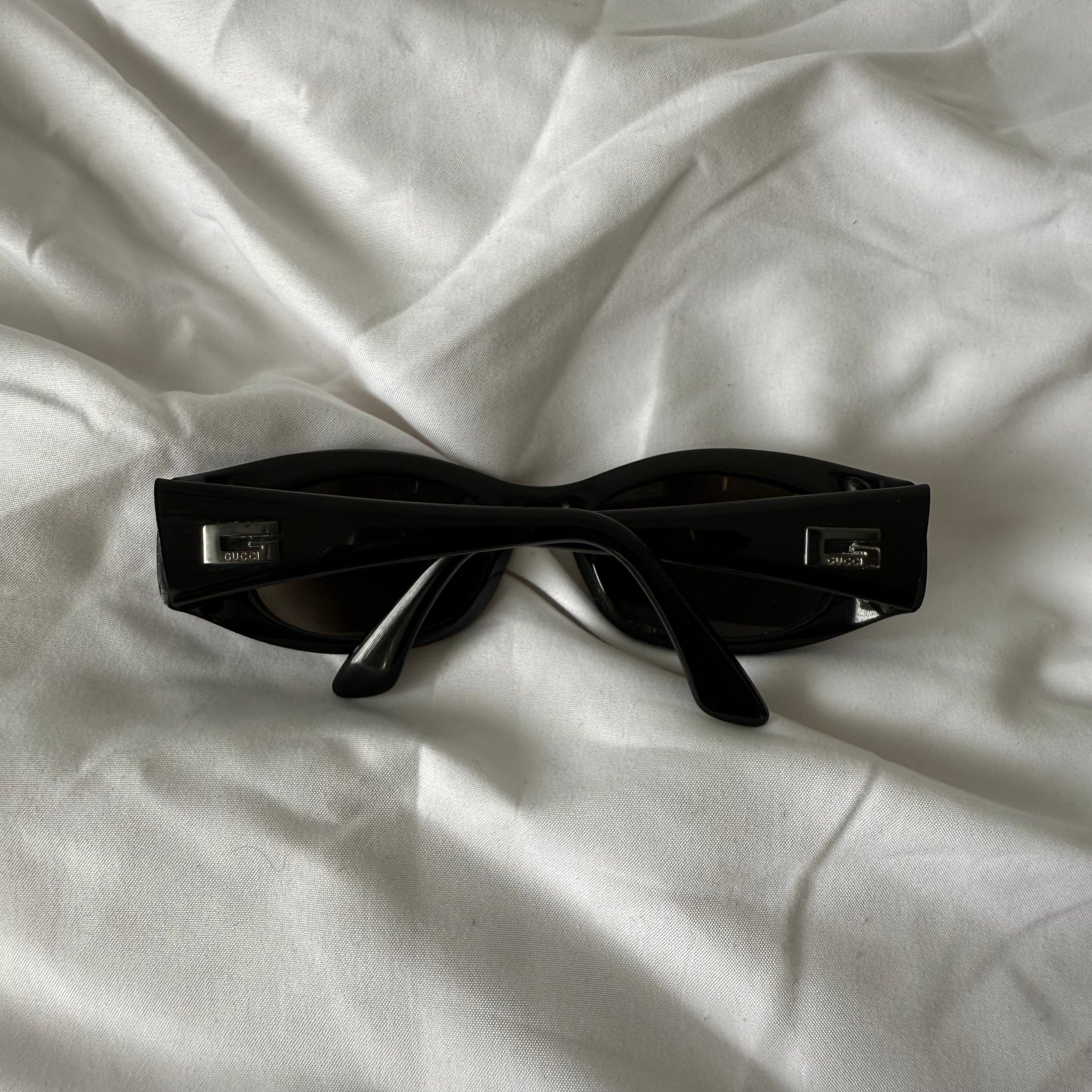 Gucci G sunglasses in black / OS