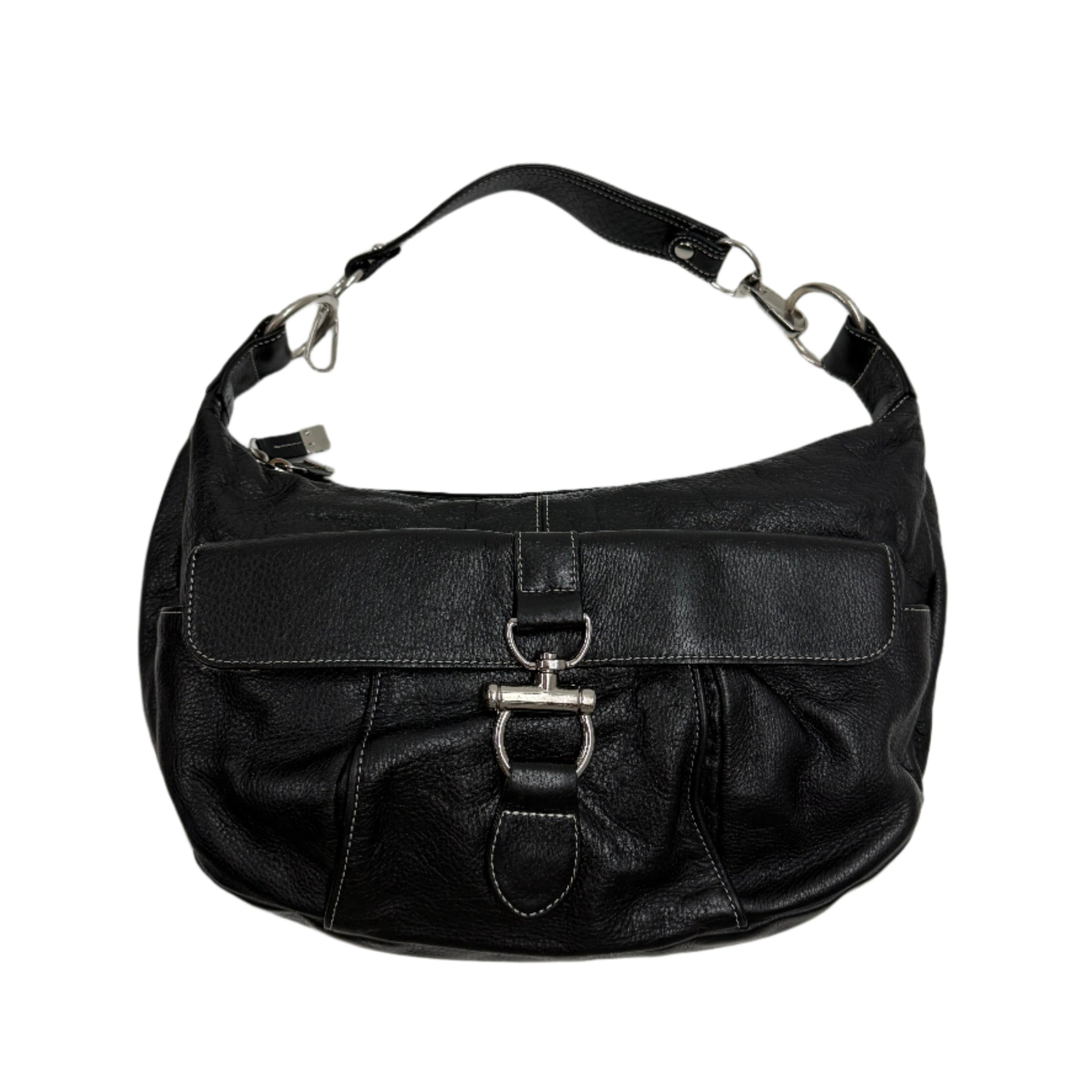 Black leather bag with silver buckles on a white background