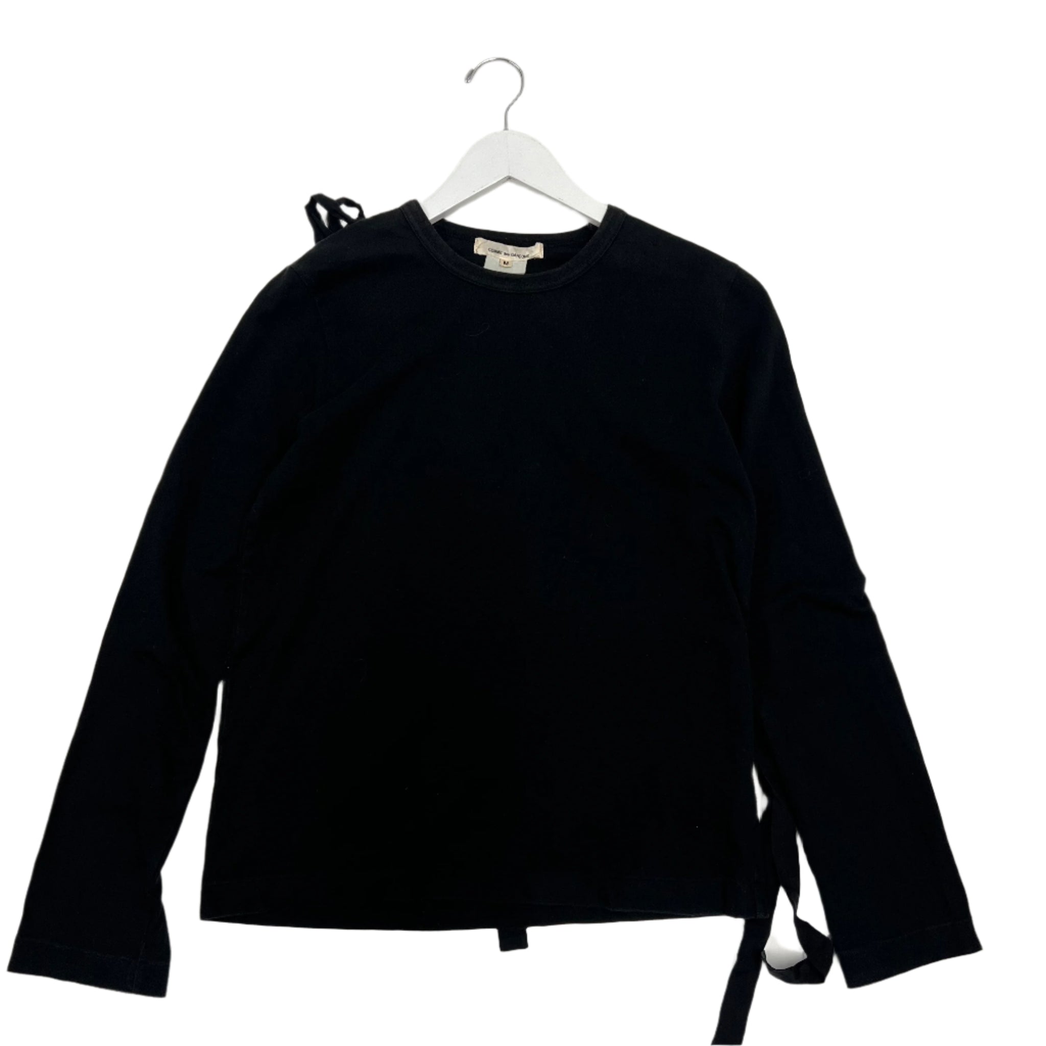 Comme des Garçons strap shirt featuring deconstructed detailing with fabric straps across the body. Avant-garde tailoring from Rei Kawakubo’s experimental collection