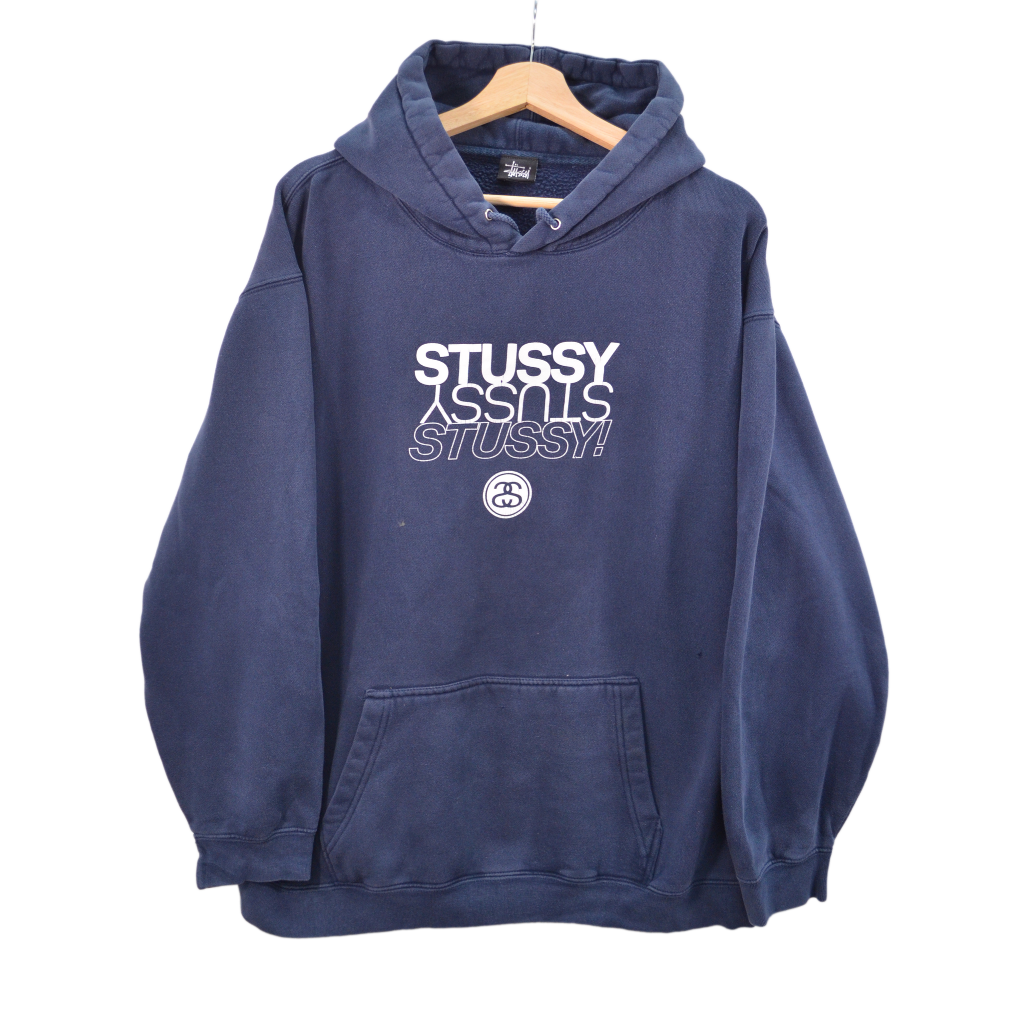 Navy blue hoodie with 'Stussy' logo on a white background